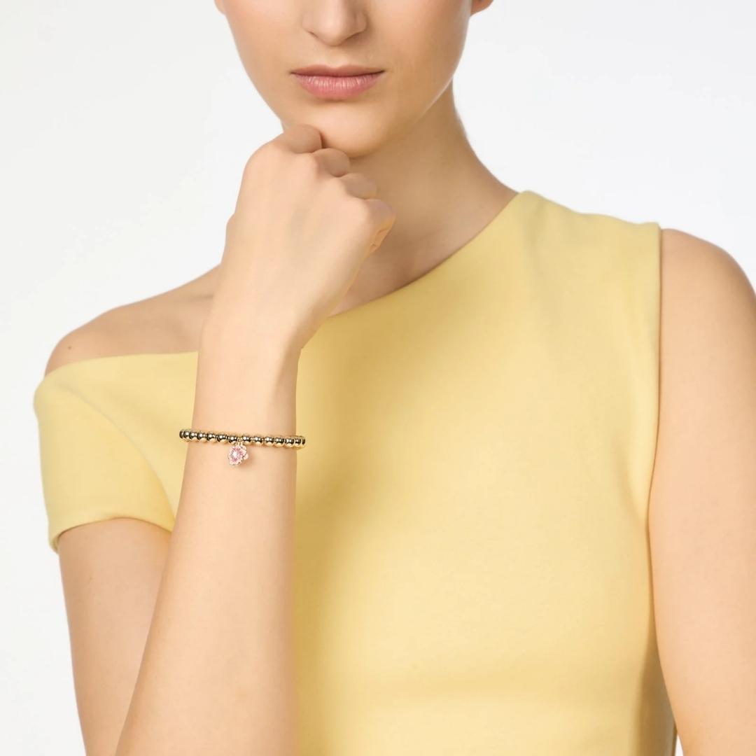 Bracciale elastico sfere e fiorellino pendente Hanami
